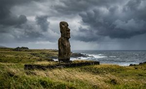 Ancient Moai statue overlooking the Pacific Ocean