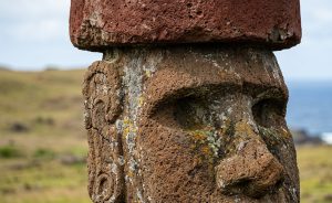 Close-up of a Moai statue with red pukao